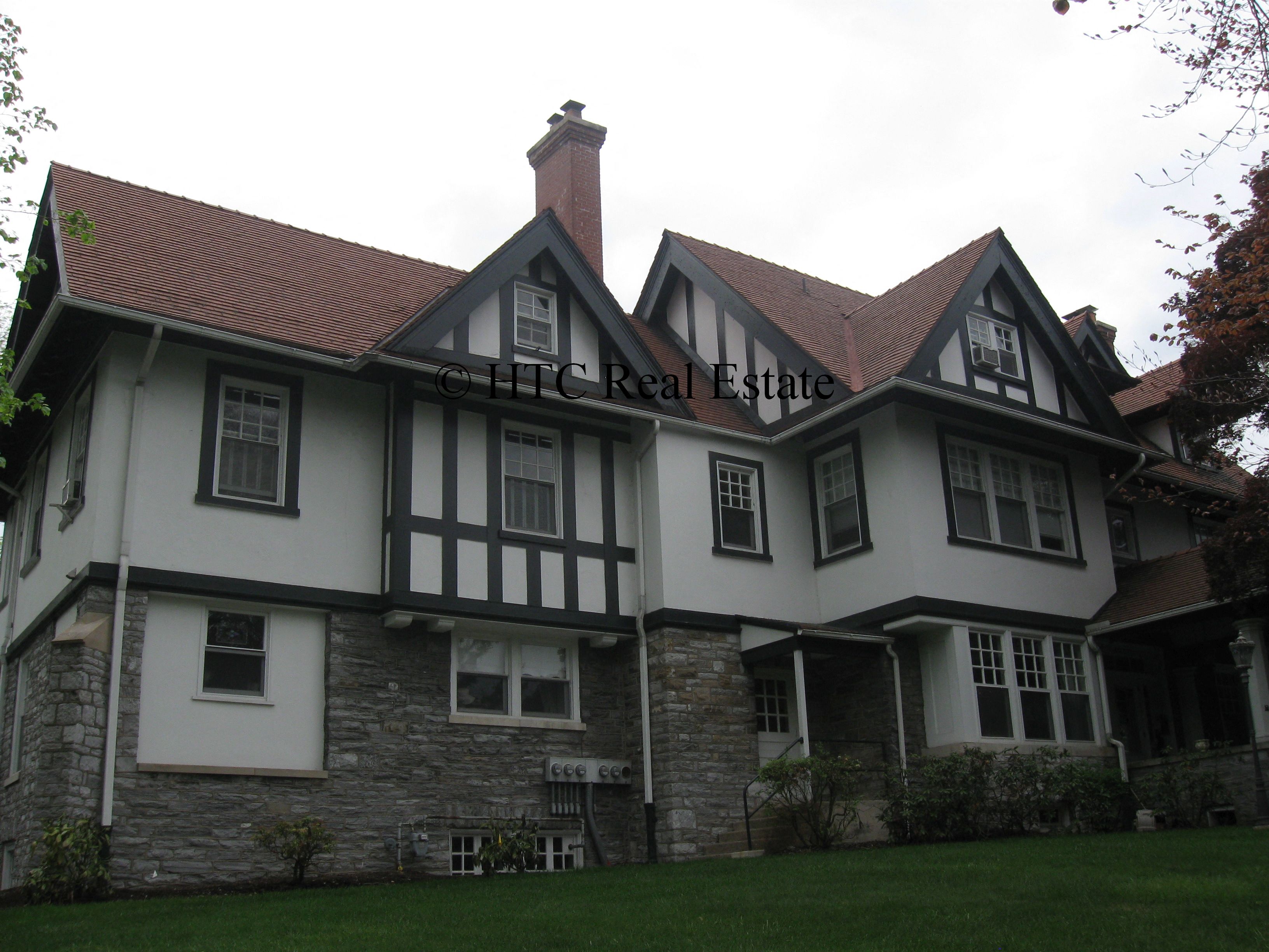 A large house with a sign that says Chichester Estate.